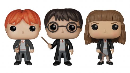 Ron, Harry and Hermione Funko Pop figures on a white background.