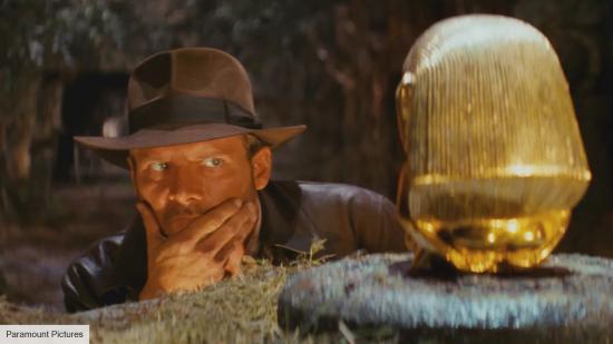 The best 80s movies: Indiana Jones looking at treasure