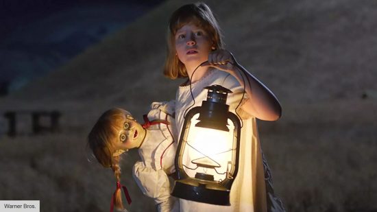 The doll Annabelle and Jessie Giacomazzi in Annabelle Creation