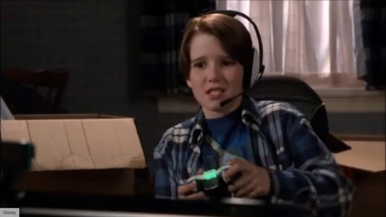 Where to watch Home Alone: The Holiday Heist: Image shows Finn playing a game.