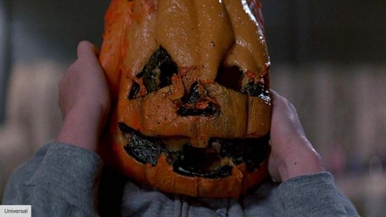 A child wearing a pumpkin mask in Halloween 3