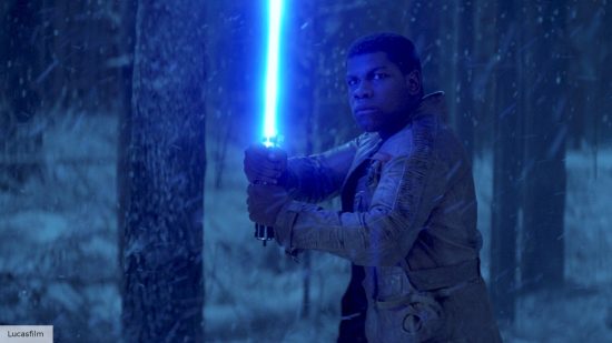 Star Wars: lightsaber colour meanings explained: Finn with a Blue Lightsaber