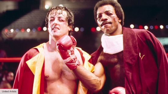 Sylvester Stallone as Rocky Balboa and Carl Weathers as Apollo Creed in Rocky