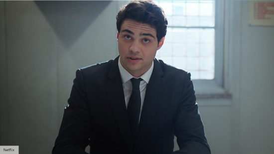 The Recruit season 2 release date: Owen sitting at a desk while wearing a suit