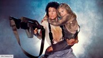 Sigourney Weaver as Ellen Ripley in Aliens holding Newt