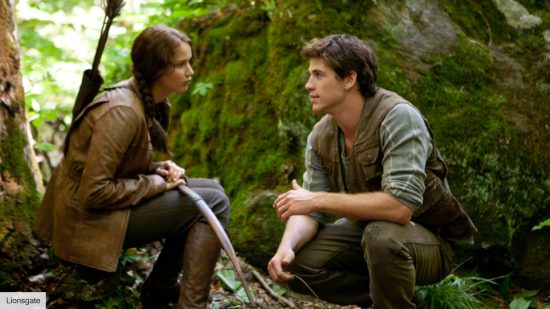 jennifer lawrence as katniss and liam hemsworth as gale in the hunger games