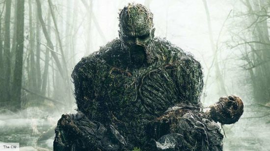 Swamp Thing release date: Swamp Thing holding a human skeleton 