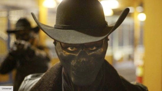 A masked killer in the horror movie The Forever Purge