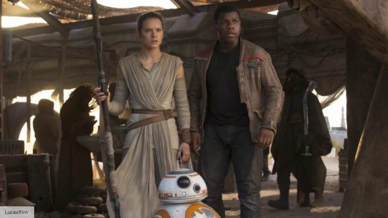 Rey, Finn and BB-8 look shocked in Star Wars The Force Awakens