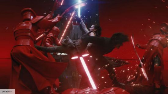 Rey and Kylo Ren battle crimson guards in Star Wars The Last Jedi