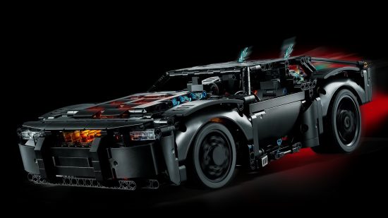 Best Lego Batman sets: The Batman Batmobile. Image shows it speeding along in the darkness.