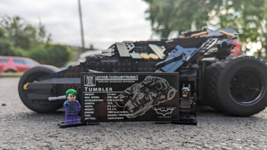 Lego Dark Knight Tumbler set photo showing the Lego Joker and Lego Batman standing beside the vehicle specs.