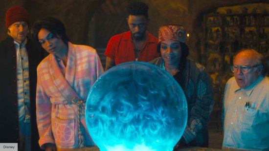 Haunted Mansion post-credits: the cast of the new Haunted Mansion movie looking into a blue glowing crystal ball