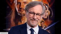 Steven Spielberg in front of the Star Wars: The Phantom Menace poster