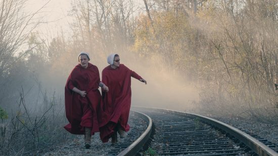 The Handmaiden's Tale season 6 release date: two women running on railroad tracks