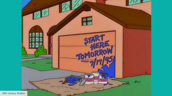 The Simpsons garage door partially painted in blue, with the words "Star here tomorrow" painted on after Homer gave up on the job