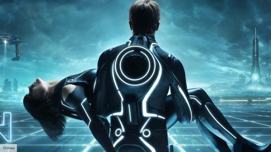Tron 3 release date: A human holding Quorra in Tron Legacy 