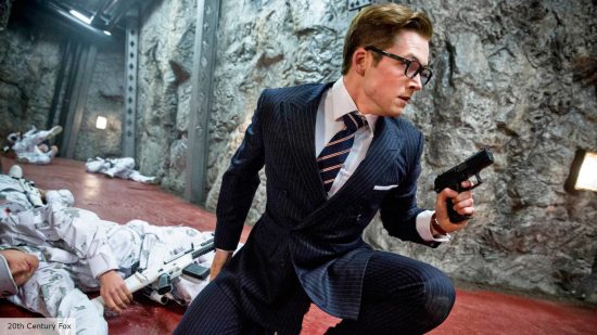 Kingsman 3 release date: Eggsy holding a gun and running from enemies 