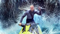 Meg 2 review: Jason Statham in the Meg 2 with a giant shark behind him