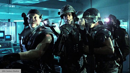 Marines from Aliens search the compound for Xenomorphs