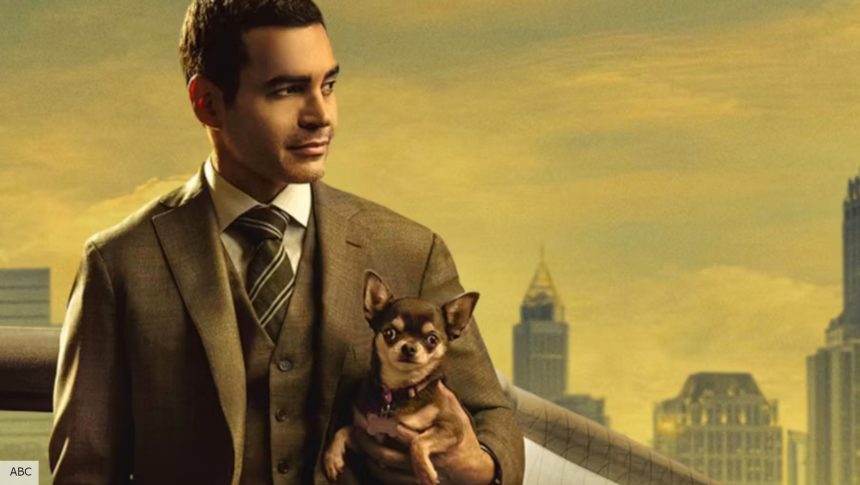 Will Trent season 2 release date: Ramón Rodríguez as Will Trent holding a dog while standing in front of a car