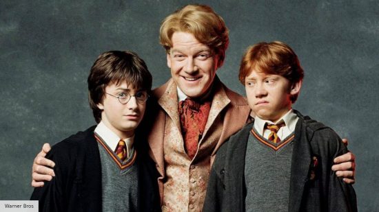 Kenneth Branagh as Gilderoy Lockart with Daniel Radcliffe as Harry Potter and Rupert Grint as Ron Weasley