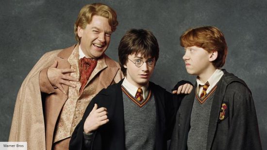 Kenneth Branagh as Gilderoy Lockhart with Daniel Radcliffe as Harry Potter and Rupert Grint as Ron Weasley