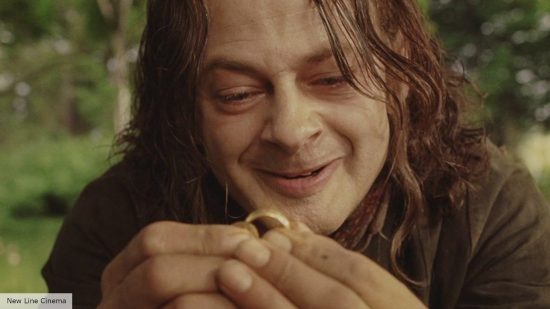 Hobbits explained: Smeagol in Lord of the Rings holding the One Ring 