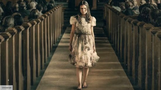 The Exorcist Believer review: Catherine walking through a church barefoot 