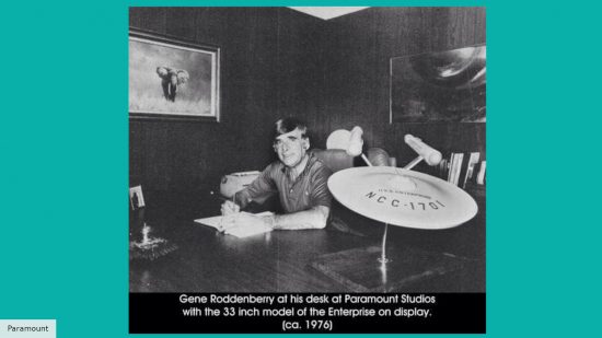 Gene Roddenberry with his model of the USS Enterprise
