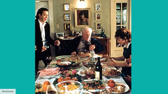 Robert Downey Jr in the dinner table scene from Home for the Holidays