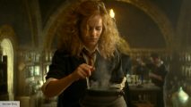 Emma Watson as Hermione Granger in the Half Blood Prince in potions class with messy hair