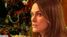 Keira Knightley in Silent Night in front of a Christmas tree from Love Actually