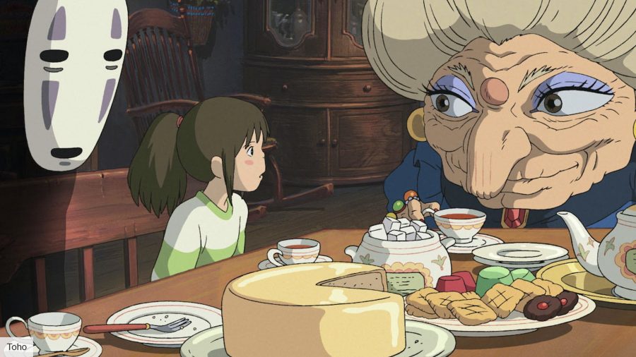 Best fantasy movies: The cast of Spirited Away sit around a table 