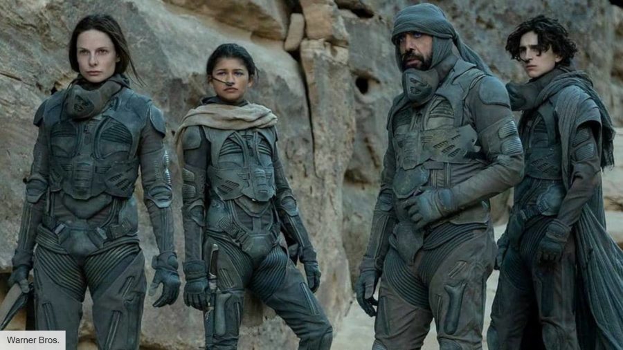 Zendaya and Timothee Chalamaet in their armoured outfits on the desert planet of Arrakis