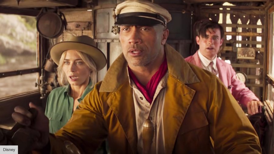 left to right: Emily Blunt, Dwayne Johnson, and Jack Whitehall aboard Johnson's boat in Jungle Cruise