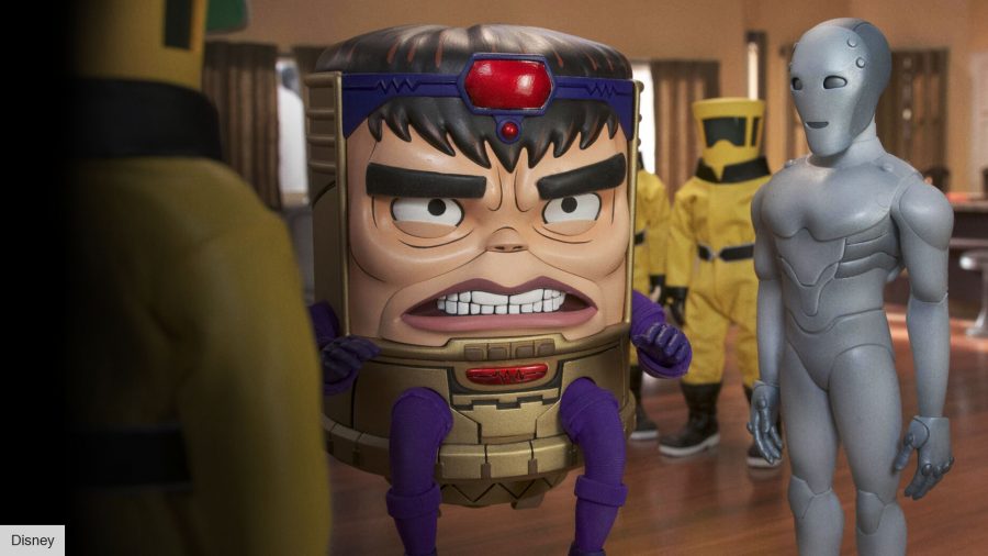 MODOK with Super-Adaptoid, his robot helper, and several AIM employees in yellow hazmat suits