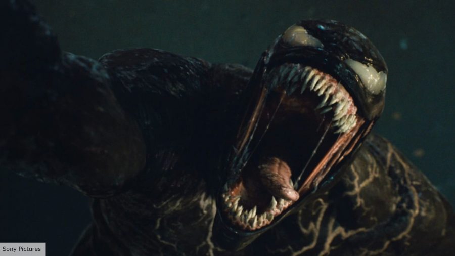 Venom opens his mouth and threatens to eat a mugger