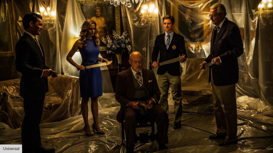 The Purge movies in order: a wealthy family killing a man 