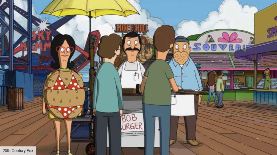 Bob's Burgers movie cast interview: Linda, Bob and Teddy standing on the Wharf 
