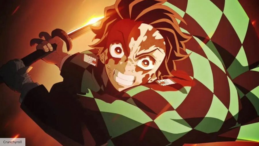 Demon Slayer season 3 release date: Tanjiro charging at a demon with a sword 